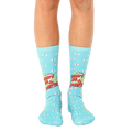 A pair of light blue crew socks with a 'Don't Be A Prick' slogan, cacti, and small eye illustrations. [lf]