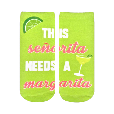 Lime green crew socks featuring a margarita graphic, lime wedge, and the text 'This Senorita Needs a Margarita' in pink and white.