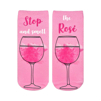Pair of pink ankle socks featuring a rosé wine glass graphic and the text 'Stop and smell the Rosé'.