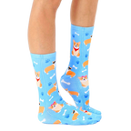 Lifestyle shot of a person wearing the corgi socks, showcasing how they look when worn. [lf]