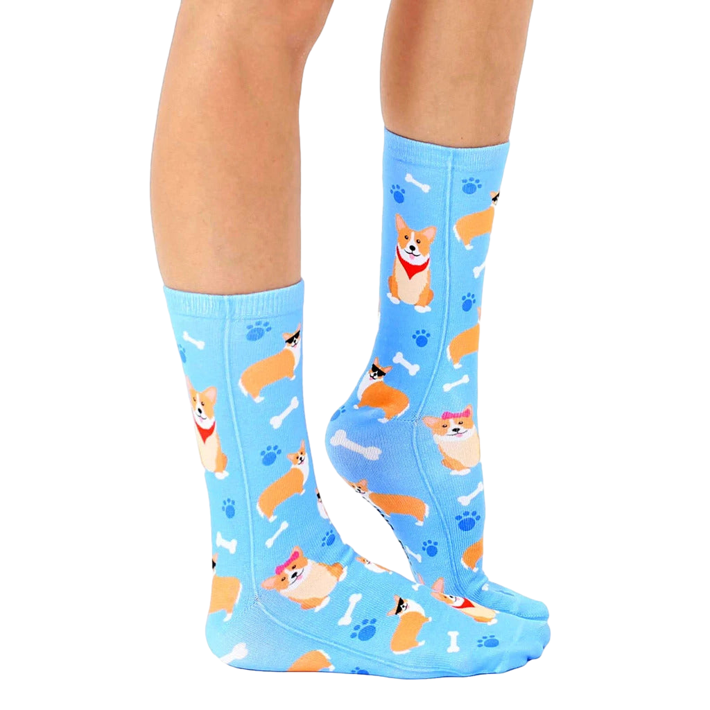 Lifestyle shot of a person wearing the corgi socks, showcasing how they look when worn. [lf]