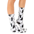 Lifestyle photo showcasing the Guitar Socks on a person's feet, showing the socks from the side. [lf]