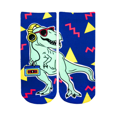 An image of a pair of blue ankle socks with a cool, teal T-Rex wearing headphones and sunglasses, holding a cassette player. The socks have a 90s-inspired geometric pattern.