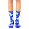 A pair of blue crew socks with a fun 90s-themed design.  The socks feature cartoon dinosaurs wearing sunglasses and boomboxes, along with yellow triangles and pink zigzags. [lf]