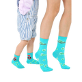 Adult and child teal crew socks.  Features cute peapod faces and 'Edamommy' text. Grippers on baby socks. [lf]