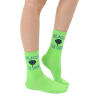 A pair of women's lime green crew socks with the phrase 'The apple doesn't fall far from the tree' and a small tree graphic. [lf]