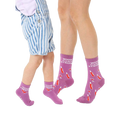 Adult and child crew socks in purple.  They feature a repeating pattern of wine bottles, wine glasses, and the text 'Wine Game Strong'. [lf]
