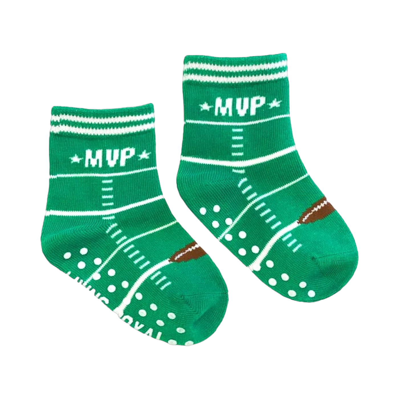 Flat lay of mini 'MVP' socks with gripper dots on the soles. Shows the small size and design details.