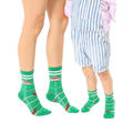 Adult and child-sized green crew socks. Football field design, brown footballs, white stripes, and 'Quarterback' text. [lf]