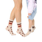 Beige crew socks with coffee cup and bean designs. Adult socks say "I need coffee", mini socks say "I'm a latte handle". [lf]