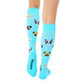 Close-up view of the back of the light blue knee-high socks; the 'Living Royal' logo is visible on the heel. [lf]