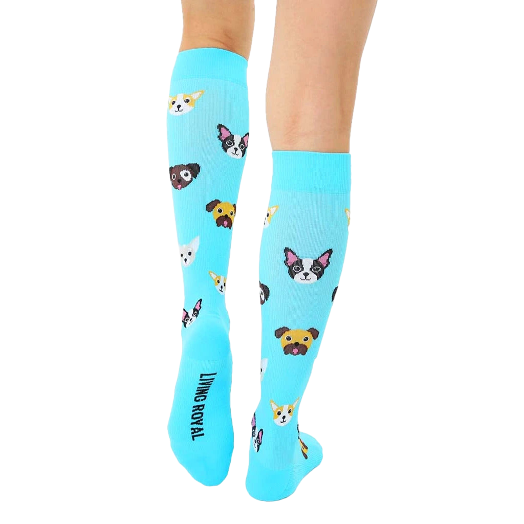 Close-up view of the back of the light blue knee-high socks; the 'Living Royal' logo is visible on the heel. [lf]