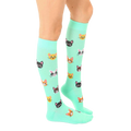 Lifestyle photo showing the cat socks on a person's legs. [lf]