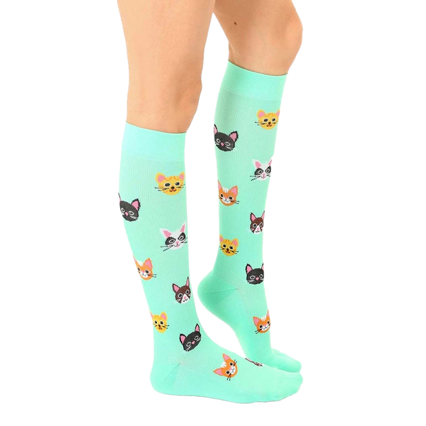 Lifestyle photo showing the cat socks on a person's legs. [lf]