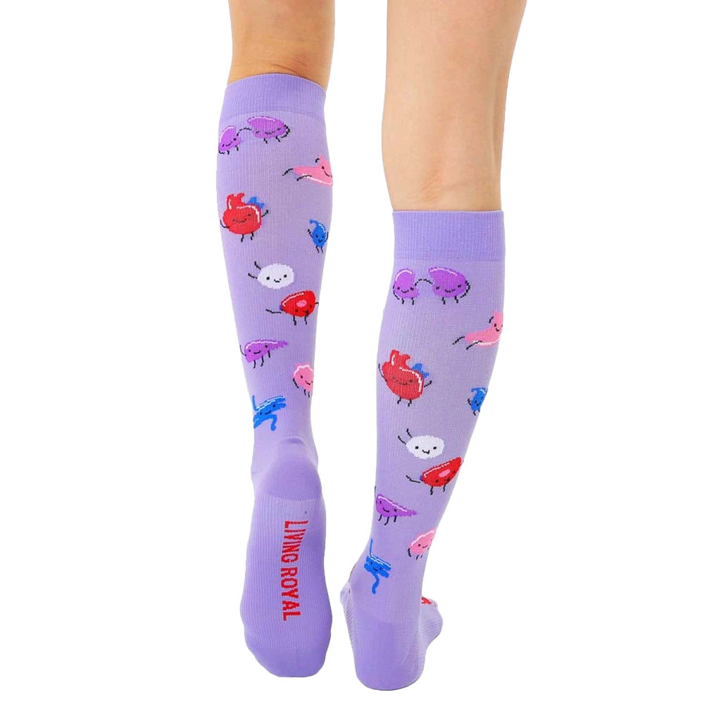 Close-up view of the back of the socks, showcasing the 'Living Royal' logo on the heel. [lf]