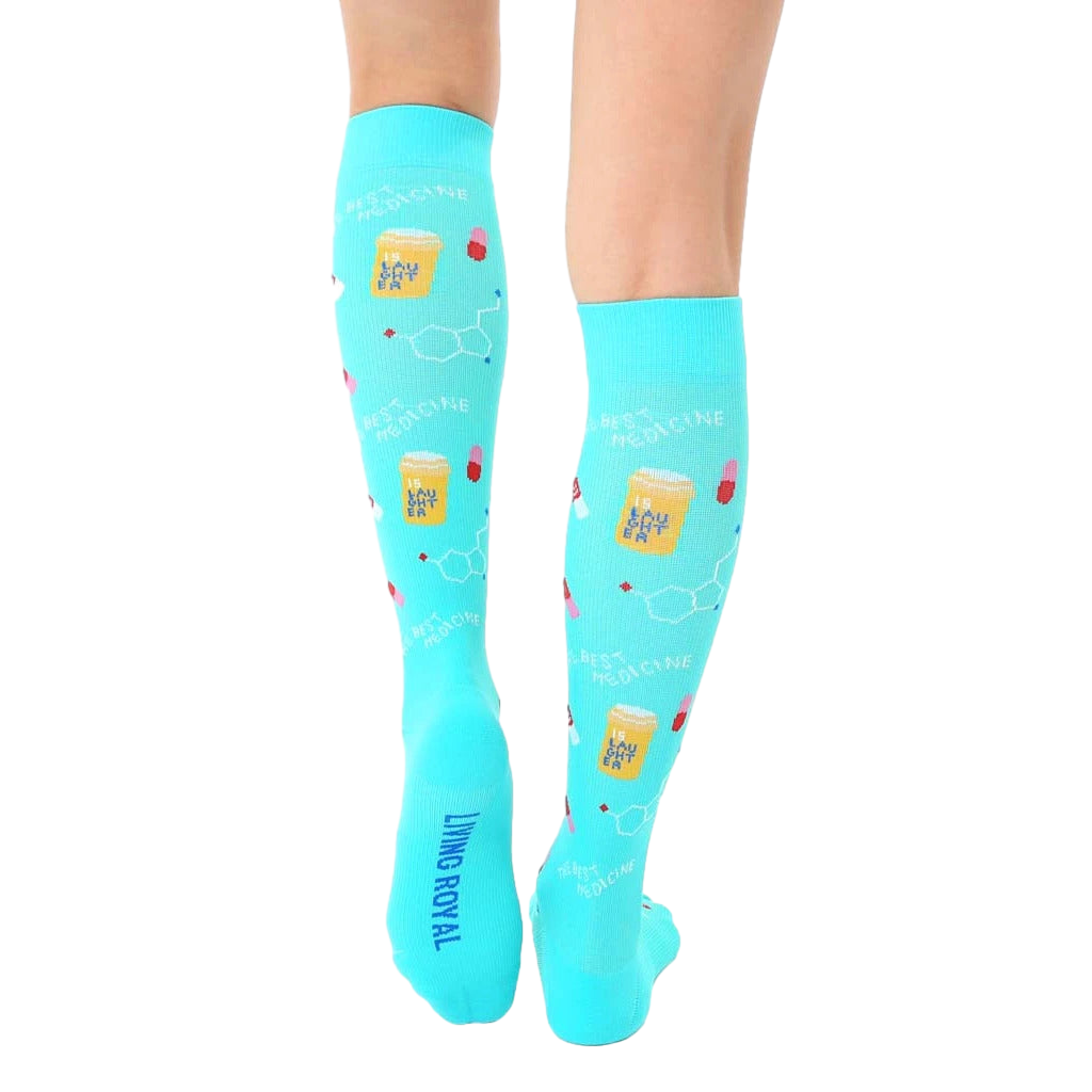 Close-up view of the back of the socks, showing the "Living Royal" logo and the full sock design. [lf]