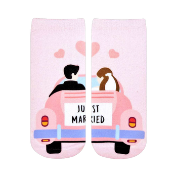 Pink ankle socks showing a cartoon bride and groom in a pink car with 'Just Married' sign.  Sweet wedding-themed design.