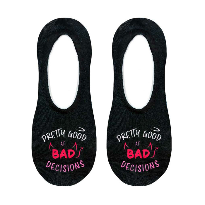 A pair of black no-show socks with the words 