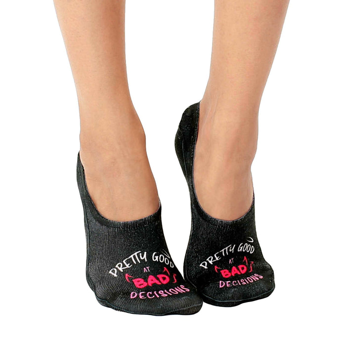 womens black liner socks with 'pretty good at bad decisions' written on them in pink.   