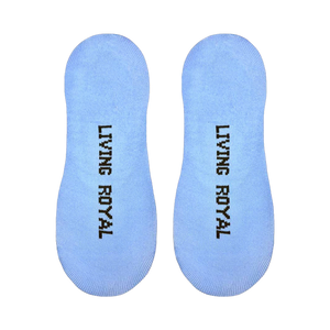 Close-up of the sole of a light blue 'F This O'Clock' sock, showing the 'Living Royal' branding.