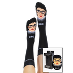 Lifestyle shot of a person wearing the Ruth Bader Ginsburg socks with the socks' packaging shown alongside. [lf]