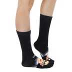 Close-up shot of the Ruth Bader Ginsburg socks showcasing the design detail on a white background. [lf]