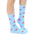 Lifestyle shot of a person's legs wearing the '#1 Nurse' socks. Shows how the socks look when worn. [lf]