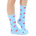 Lifestyle shot of a person's legs wearing the '#1 Nurse' socks. Shows how the socks look when worn. [lf]