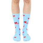 Pair of light blue crew socks with a red heart, EKG line, and '#1 Nurse' design. Perfect for nurses! [lf]