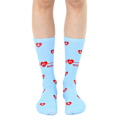 blue #1 nurse crew socks for men and women feature red hearts, caduceus symbols, and red #1 nurse text