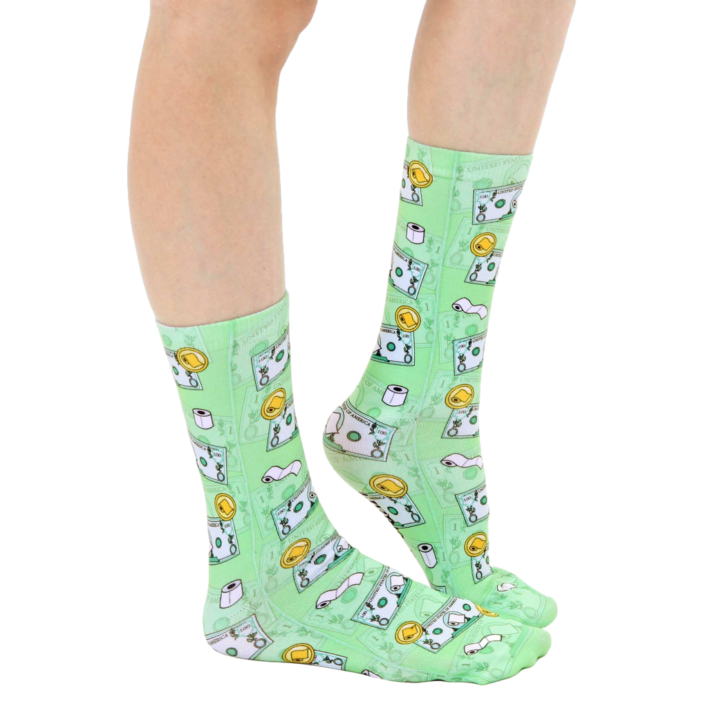 Lifestyle shot showcasing 'Toilet Paper Bills' socks on a model's feet, showing how they fit and look when worn. [lf]