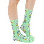 Lifestyle shot showcasing 'Toilet Paper Bills' socks on a model's feet, showing how they fit and look when worn. [lf]
