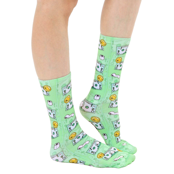 Lifestyle shot showcasing 'Toilet Paper Bills' socks on a model's feet, showing how they fit and look when worn. [lf]