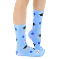 Lifestyle shot of a person's legs wearing the graduation socks, showing how they look when worn. [lf]