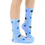 Lifestyle shot of a person's legs wearing the graduation socks, showing how they look when worn. [lf]