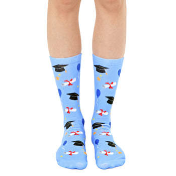 blue crew socks with graduation caps, balloons, stars, and diplomas. perfect for men and women   