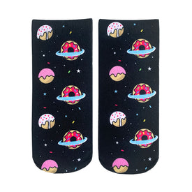 donut planet themed ankle socks for women. black background, pink frosting on donuts, rainbow sprinkles. planets are blue with yellow and white rings.   