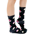 Lifestyle shot of a person's legs wearing the Galaxy Donut socks, showcasing the socks' fit and design. [lf]