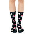 Crew socks in black with pink and white donut designs orbiting like planets against a starry background. [lf]