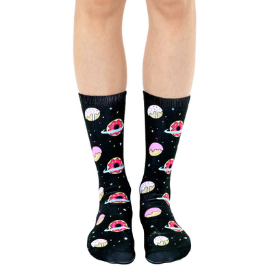 cartoonish donut and planet pattern socks in black, crew length, for men and women.  