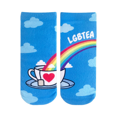 Crew socks featuring a rainbow pouring into a teacup with a heart, clouds, and 'LGBTEA' text on a light blue background.
