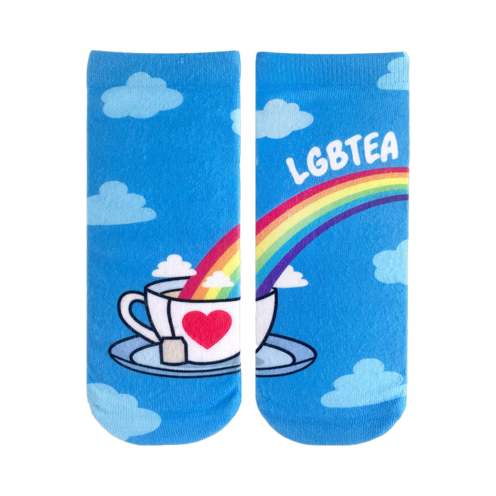 Crew socks featuring a rainbow pouring into a teacup with a heart, clouds, and 'LGBTEA' text on a light blue background. }}