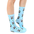 Lifestyle shot of model wearing light blue panda bamboo socks. [lf]