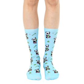 light blue crew socks with all-over cartoon panda and bamboo pattern.   