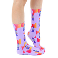 Lifestyle shot showing the socks on a person's feet, showcasing the socks in a casual setting. [lf]