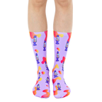 Pair of purple crew socks with a fun lava lamp pattern.  Orange and blue lava lamps are scattered on a light purple background with orange blob accents. [lf]