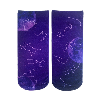 Pair of ankle socks with a dark purple background, featuring pink and white constellations and moons. 