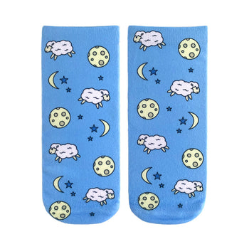 blue ankle socks with a pattern of cartoon sheep wearing nightcaps and jumping over crescent moons.  