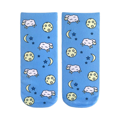 Pair of light blue crew socks with a repeating pattern of white sheep, yellow moons, and blue stars.