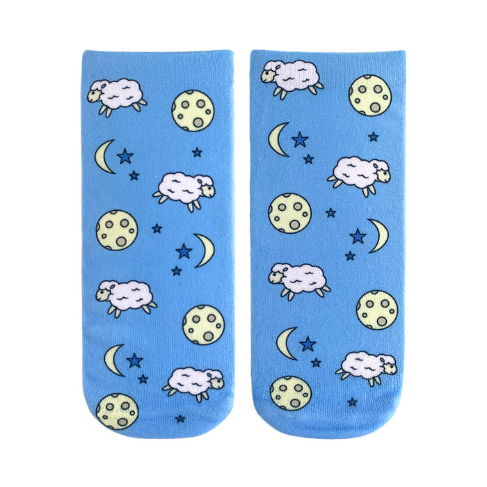 blue ankle socks with a pattern of cartoon sheep wearing nightcaps and jumping over crescent moons.   }}
